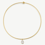 A delicate gold wire necklace with a small teardrop-shaped clear gemstone pendant, displayed against a clean white background.
