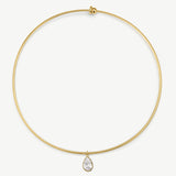 A delicate gold wire necklace with a small teardrop-shaped clear gemstone pendant, displayed against a clean white background.