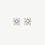 Pair of diamond stud earrings on a white background